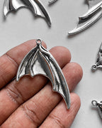 Devil Feather Charm