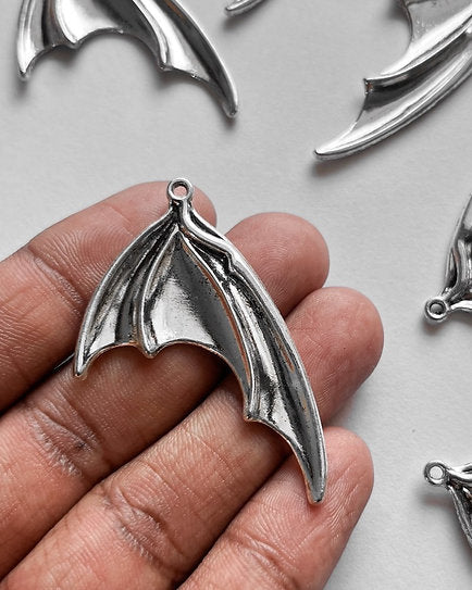 Devil Feather Charm